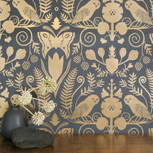 Load image into Gallery viewer, Barn Owls and Hollyhocks by Carson Ellis - Gold on Charcoal Wallcovering