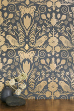 Load image into Gallery viewer, Barn Owls and Hollyhocks by Carson Ellis - Gold on Charcoal Wallcovering